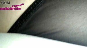 A mature woman explores intimate connections in a private setting