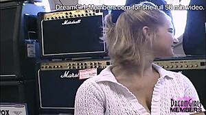 damn! milf flashes huge tits and pussy in guitar shop
