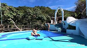 Tattooed latina with big silicone tits gets freaky by the pool