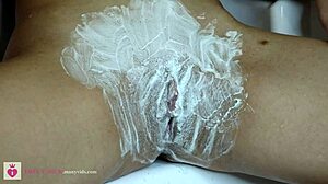 Close-Up Shaving of Hairy Vagina with Trimmer and Razor