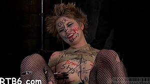 Taming a leather pet in rough BDSM with blowjob and femdom domination.