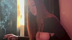 Artemisia Love Feels Sexy Showing Big Boobs While Smoking Fetish Session