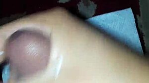 Enjoying a solo session with adult videos