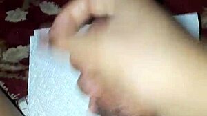 Enjoying a solo session with adult videos