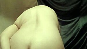 Slave endures self-bondage and wax play outdoors