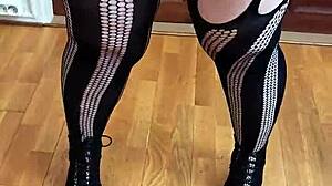 Who is this goth domina in the scene?