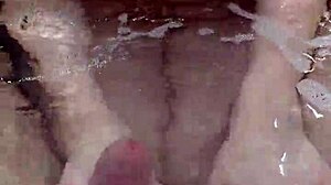 Bath Handjob Leads To Underwater Cumshot