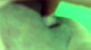 alone at home, she indulges in some private masturbation with her shaved pussy