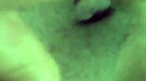 alone at home, she indulges in some private masturbation with her shaved pussy