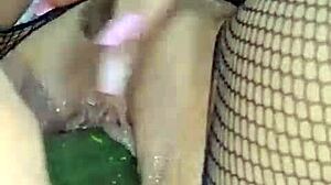 Latina milf shoves cucumber deep for wild squirting pleasure.