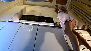 A hot skinny girl meets her friend for fake casting in changing room