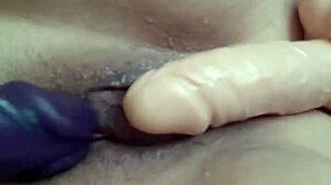 Rubbing my big pussy with two dildos