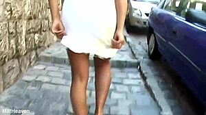 Stella grins while sucking cock on camera in stockings