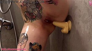solo girl with tattoos uses dildo for tight anal