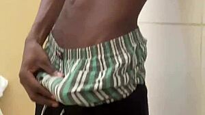 a guy busts a nut in public bathroom with huge black cock