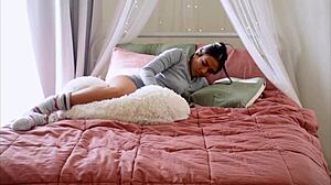 cute asian girl intriguingly humps her pillow in solo masturbation session