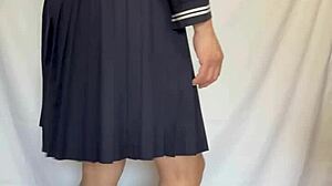 Japanese Babe in Sailor Uniform Teases with Buttplug