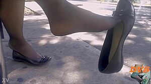 Want to see candid shoeplay with nylon stockings and flats?