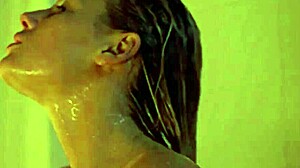 tania saulnier looks so hot in that steamy shower!