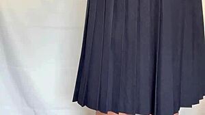 Japanese Babe in Sailor Uniform Teases with Buttplug