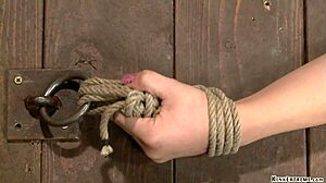 Lezdom Punishes Bound Slave with Vibrator in Hogtie Position