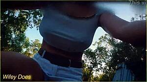 amazing milf flashes big tits while riding bike in public outdoor setting