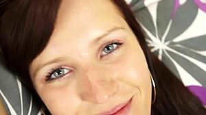 The innocent beauty moans while touching her pussy at bedtime