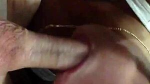 Girlfriend eagerly sucks boyfriend's cock as friend joins in.