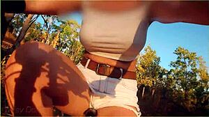 amazing milf flashes big tits while riding bike in public outdoor setting