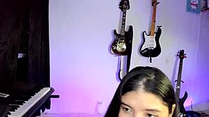 Cute girl masturbates with dildo on webcam close-up