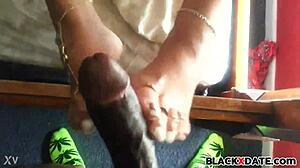 Excellent Black Babe Teases with Homemade Footjob