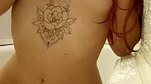 Redhead teen 18+ gets wet and wild in steamy bath