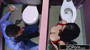 Busty brunette takes mystery man through gloryhole