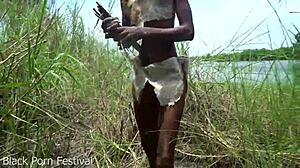 Skinny Ebony Woman Works Outdoor In African Tribe