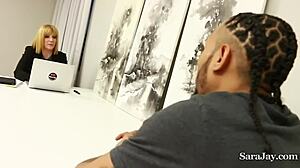 Hot HR lady Sara Jay gives interracial boobjob after hardcore fuck