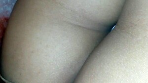 i'm filming my sister-in-law's sexy ass while she bends over in the kitchen, her curves so tempting