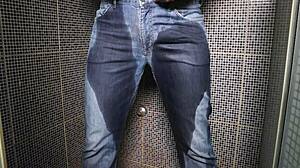 Guy pees in wet jeans and cums publicly