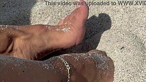 blonde milf acts as the hottest slut on the beach.