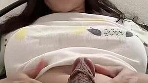 shemale puts hair clamp on cock while masturbating