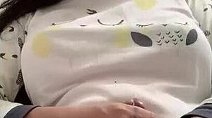 shemale puts hair clamp on cock while masturbating