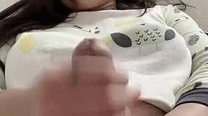 shemale puts hair clamp on cock while masturbating