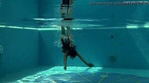 Irina russaka shows off underwater in tight outfit