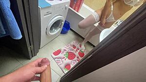 Jerking off to my stepmom in the bathroom, feeling intense arousal.