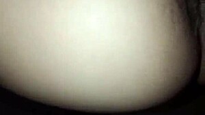 Young amateur bent over in doggy style close-up.