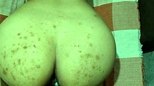 Hot brunette couple video on the sofa