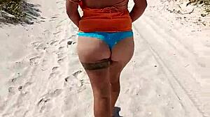 Look at her tits and ass on the beach!