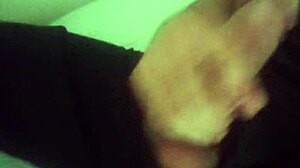 horny guy moans while jerking his huge cock in bedroom after work, cumming hard