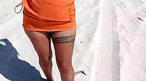 Look at her tits and ass on the beach!