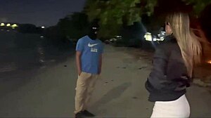 my wife giving it to another on the beach sand