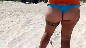 Look at her tits and ass on the beach!